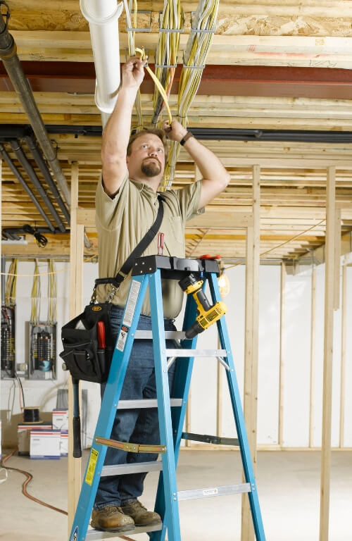 Electrician using Werner FS108 Step Ladder